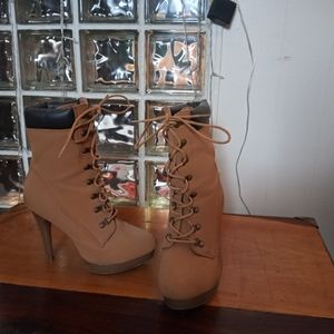 Construction type heeled boot